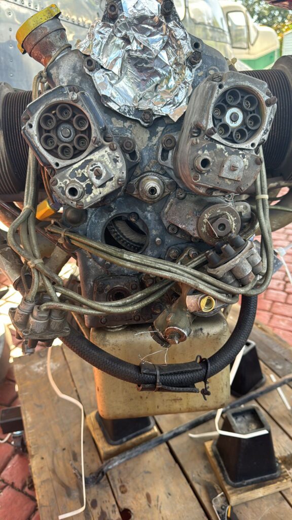 Engine bay and wiring of AMCAI’s donated 1947 Navion awaiting student restoration